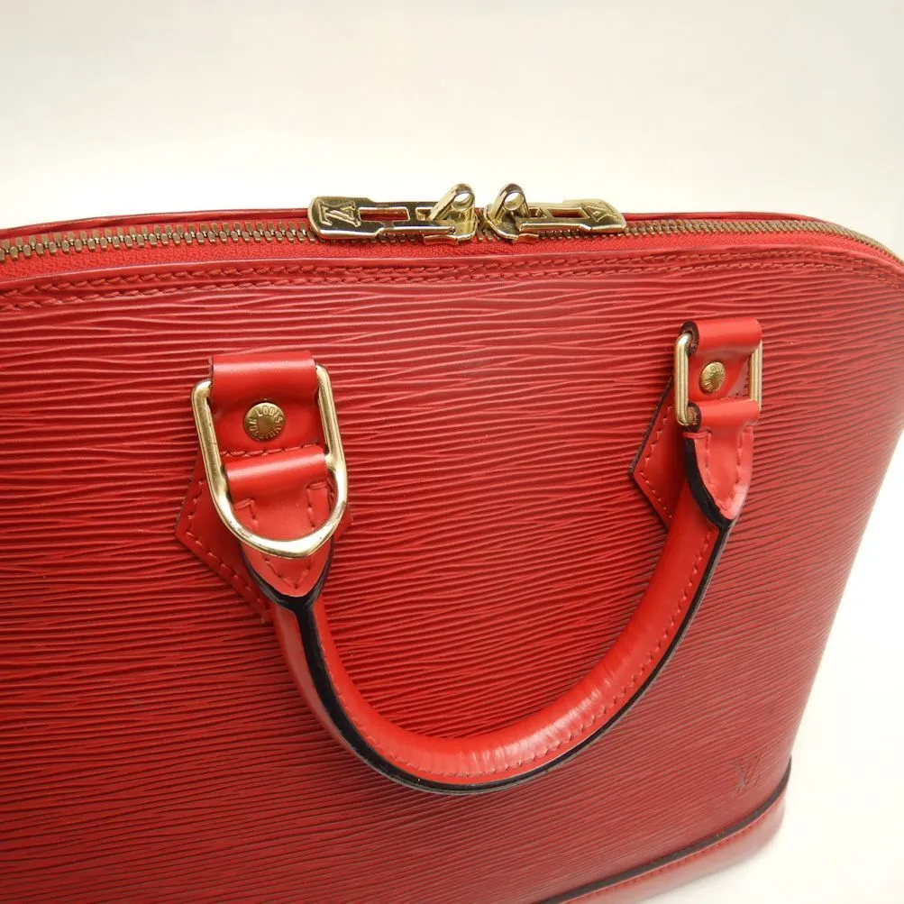 Louis Vuitton Epi Handbag Alma Castilian