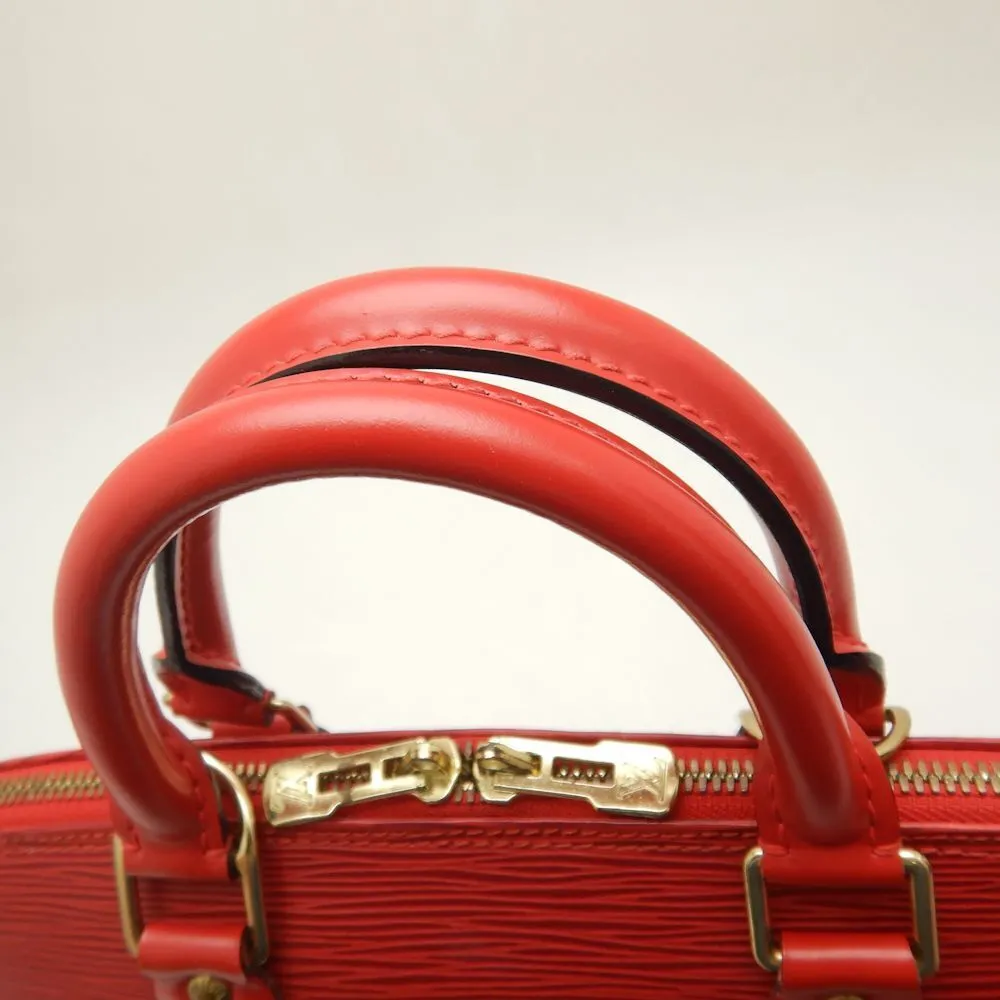 Louis Vuitton Epi Handbag Alma Castilian